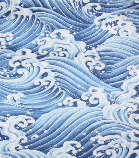 blue fabric containing blue metallic accent weave|Blue Waves Quilt Metallic Cotton Fabric by Keepsake Calico.